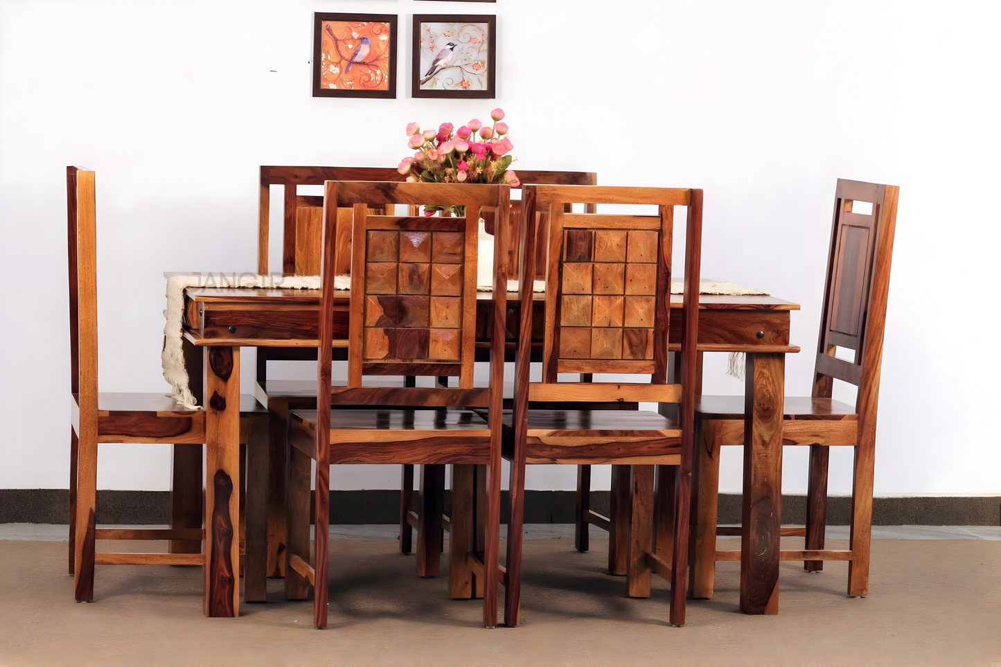 Enhance the elegance of your dining space with a six and four seater wooden dining table and chairs made with sheesham wood, combination that exudes timeless style and sophistication. Shop now