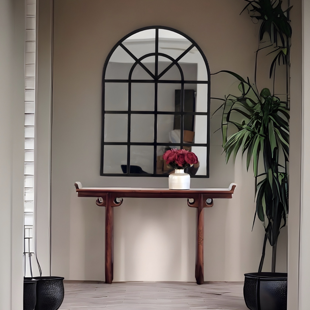 Elevate your home with our exquisite arched wall mirror reminiscent of classic window style. Add a touch of glamour and open up your space with the perfect metal accent for foyer or hallway. Shop now