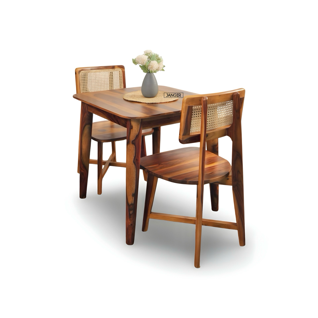 Discover the Aqua Two Seater Dining Set crafted from premium Sheesham wood and natural cane. Perfect for stylish, compact dining spaces—shop now!