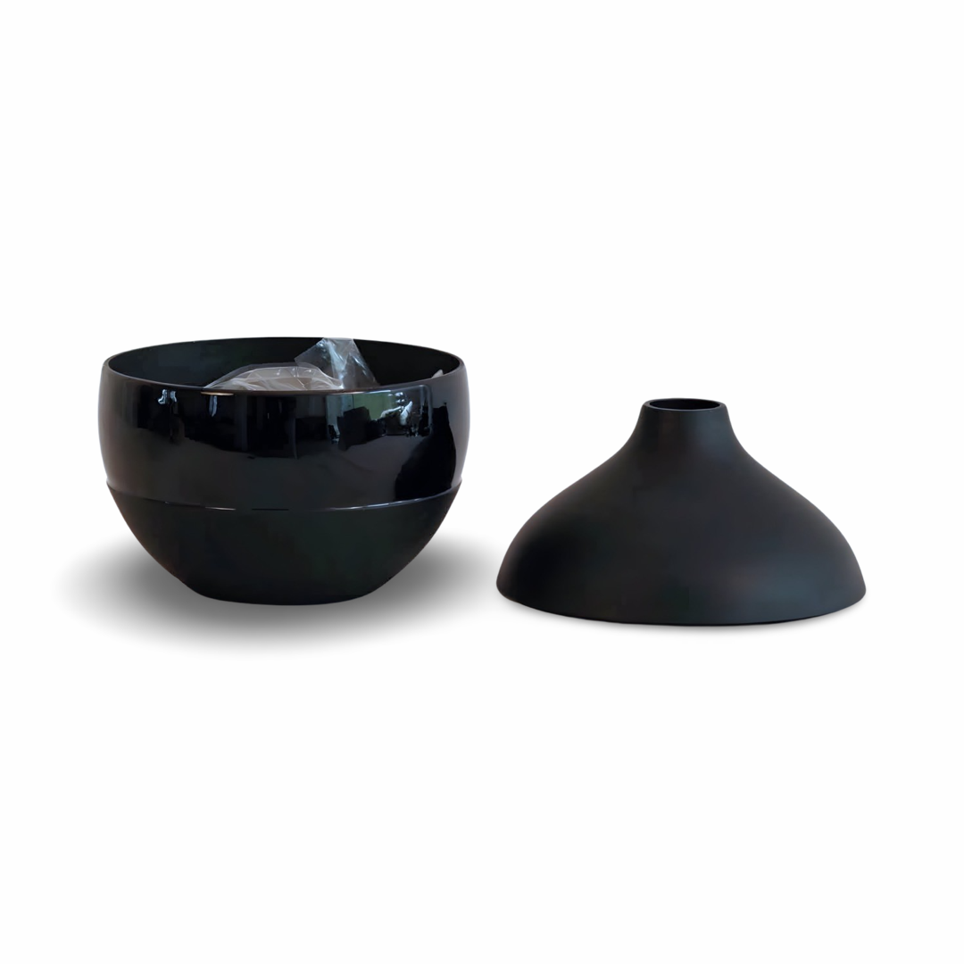Elevate your home decor with our Flower Vase Set. Crafted from metal in black matt, these vases are perfect for adding a touch of sophistication to any space. Shop online and redefine your space!