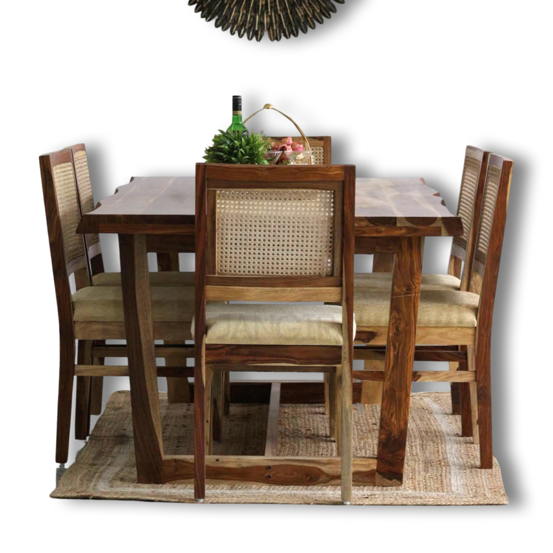 Indulge in a touch of nature's with our live edge dining table with cane weave chairs. Crafted from Sheesham wood, Discover the perfect six-seater dining set to transform your dining room, Shop now!