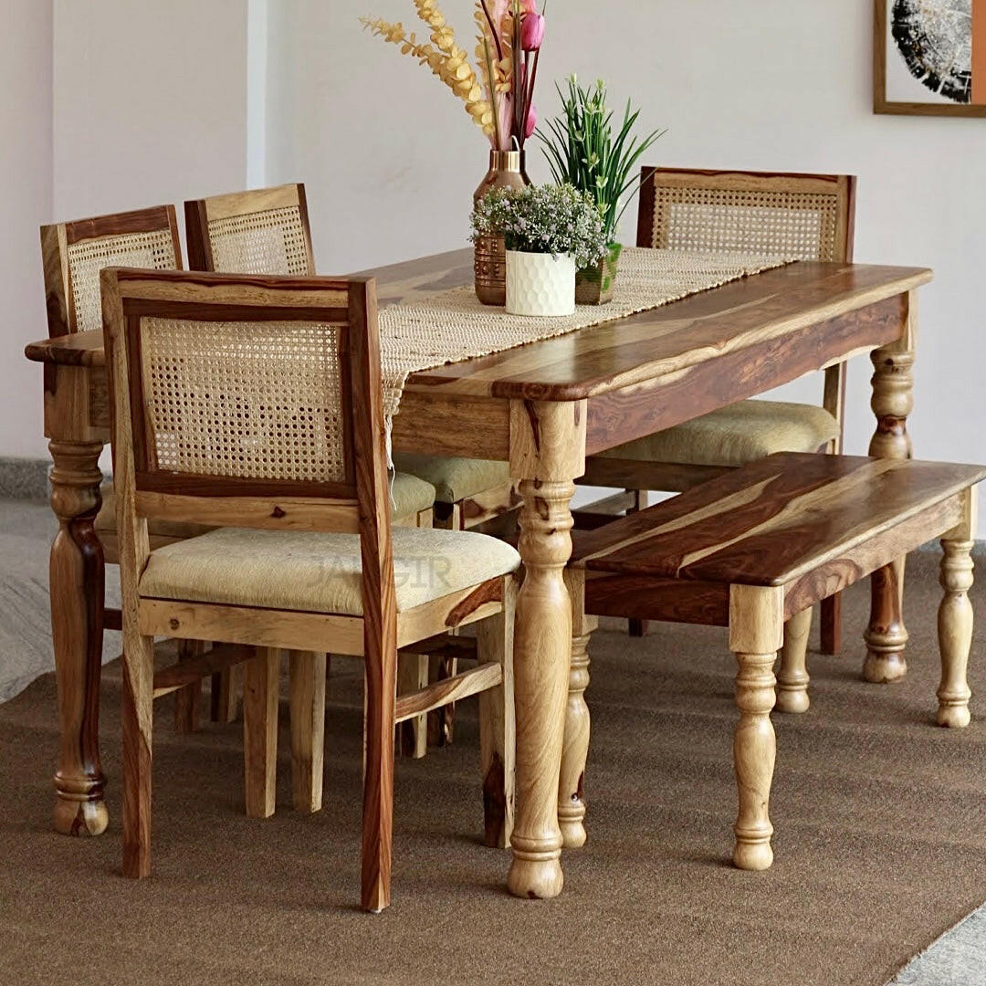 Elevate Your Dining room with our sheesham wood Nar Round Leg Dining Table With Cane Chairs. Buy Rattan-Wicker modern dining tables near you in Bangalore!