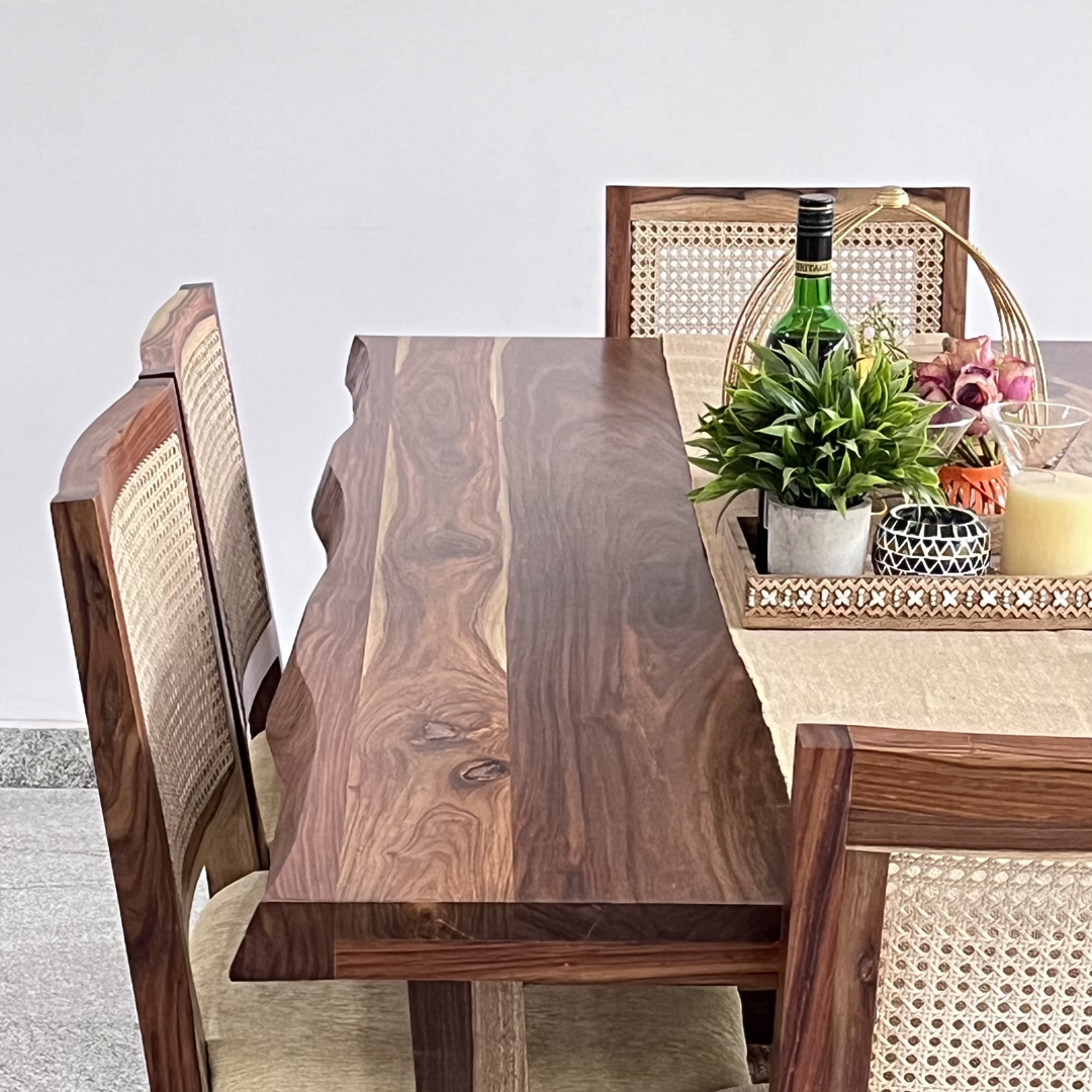 Transform your dining room with Sheesham wood made Rover live edge dining table with cane weave chairs. Buy six seater live edge dining table in India
