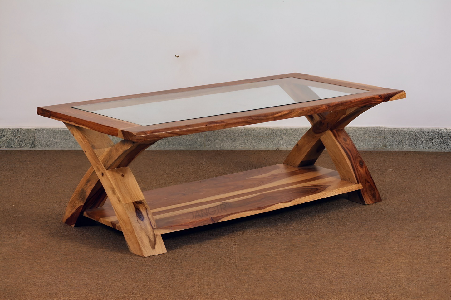 Transform your living room with our designer coffee table with open storage and a glass top. Made with sheesham wood. Elevate your home decor with our   center tables near you in Bangalore, Shop Now