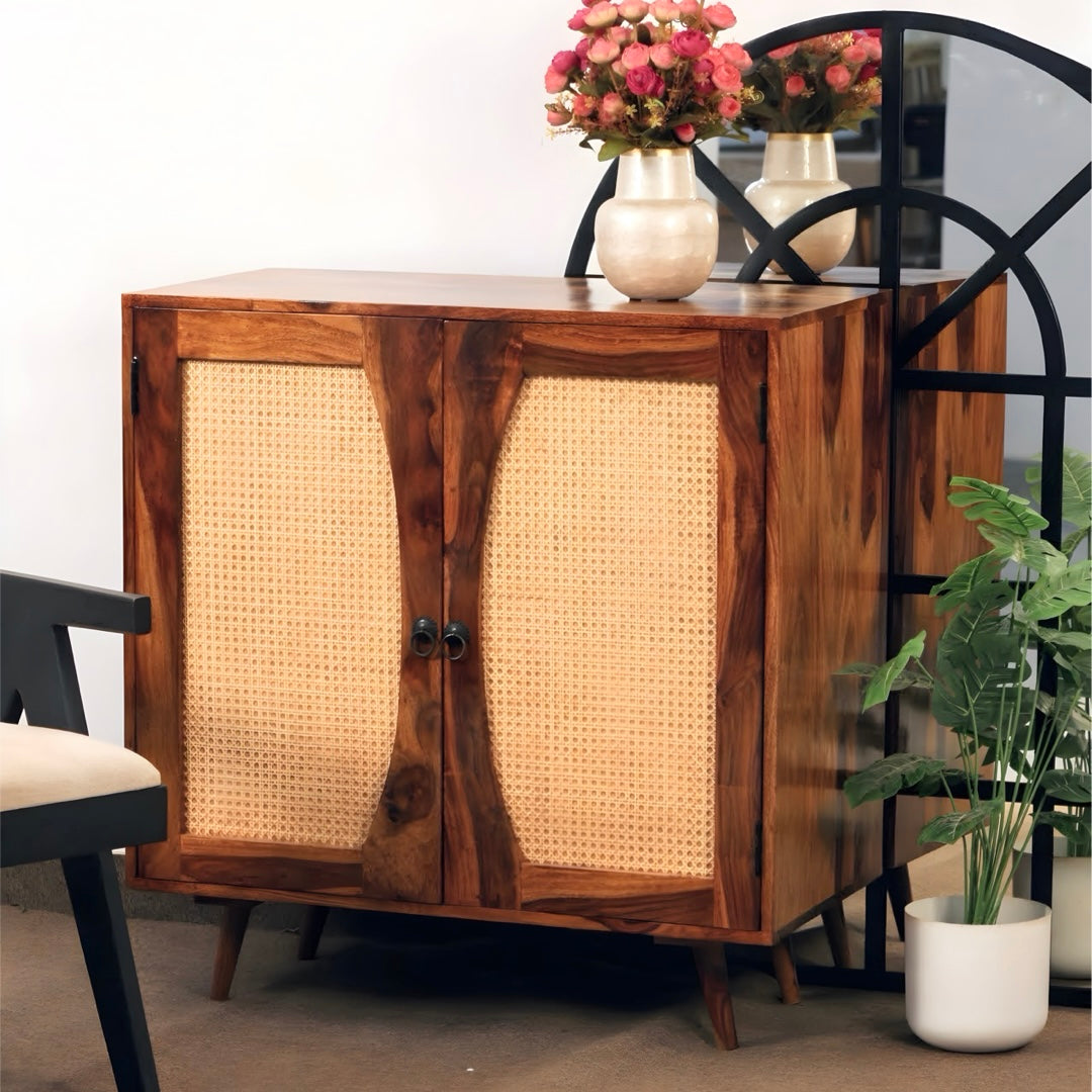 Upgrade your living room with our Mewar Cane Cabinet With Two Doors, made from sheesham wood. Buy Wicker/ Rattan Cabinet for living room near you in Bangalore