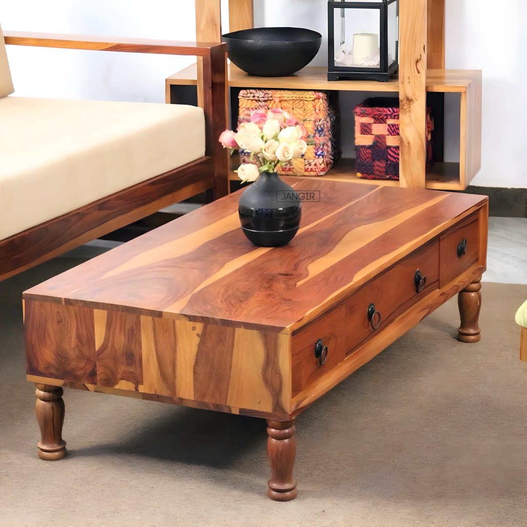 Elevate your living room with our stylish low coffee table near you in Bangalore. Made from sheesham wood, this center table designed with drawers that magically make messes disappear. Get yours now!