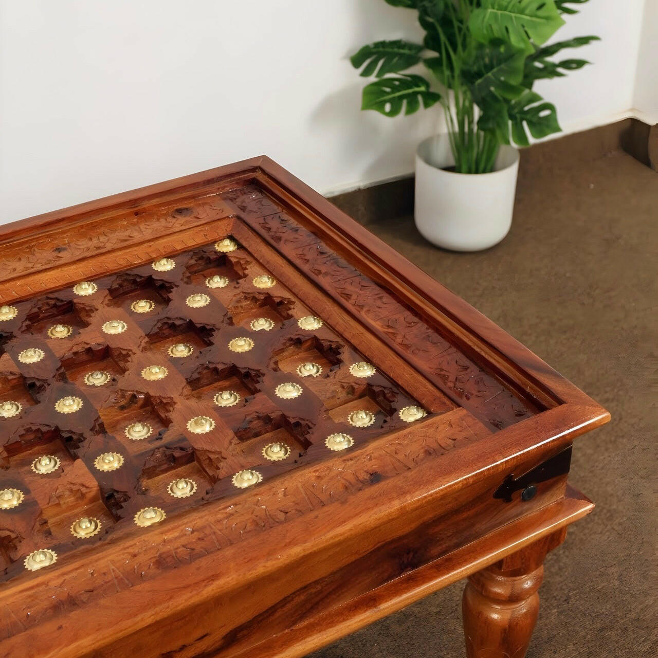 elevate your home with our Antique Carved Door Solid Wood Coffee Table with Vintage style Rajasthani Brass work and stunning carved door style. Upgrade your living room with our center table now !