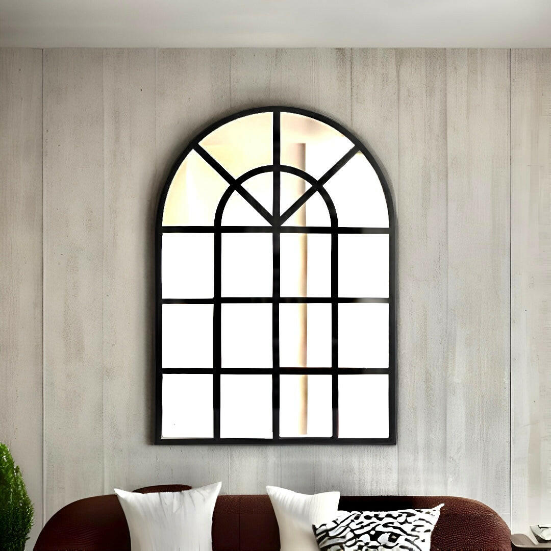 Elevate your home with our exquisite arched wall mirror reminiscent of classic window style. Add a touch of glamour and open up your space with the perfect metal accent for foyer or hallway. Shop now