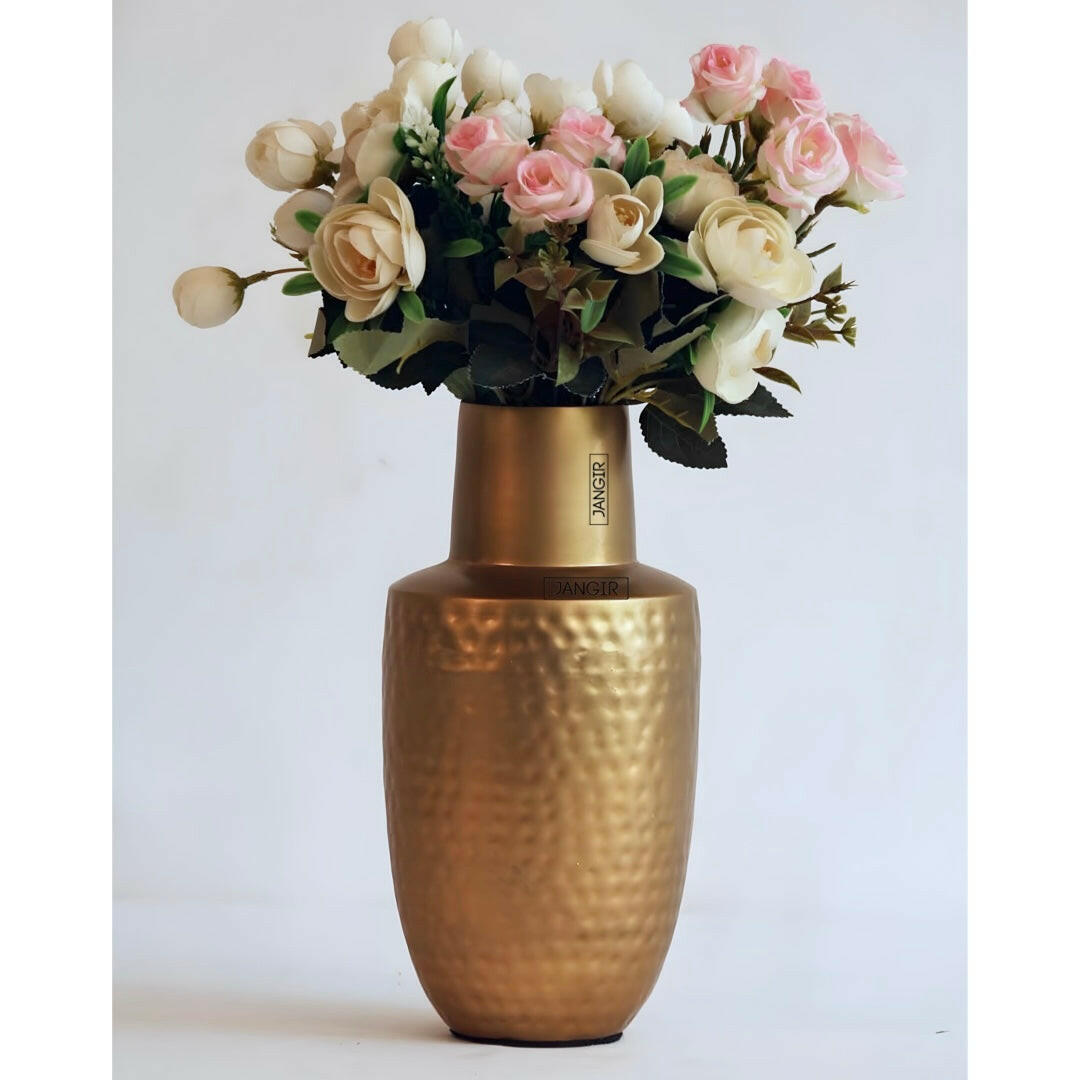 Enhance your living room decor with our exquisite hammered flower vase in a dazzling brass finish, crafted with metal.  Buy online now for an elevated home ambience!