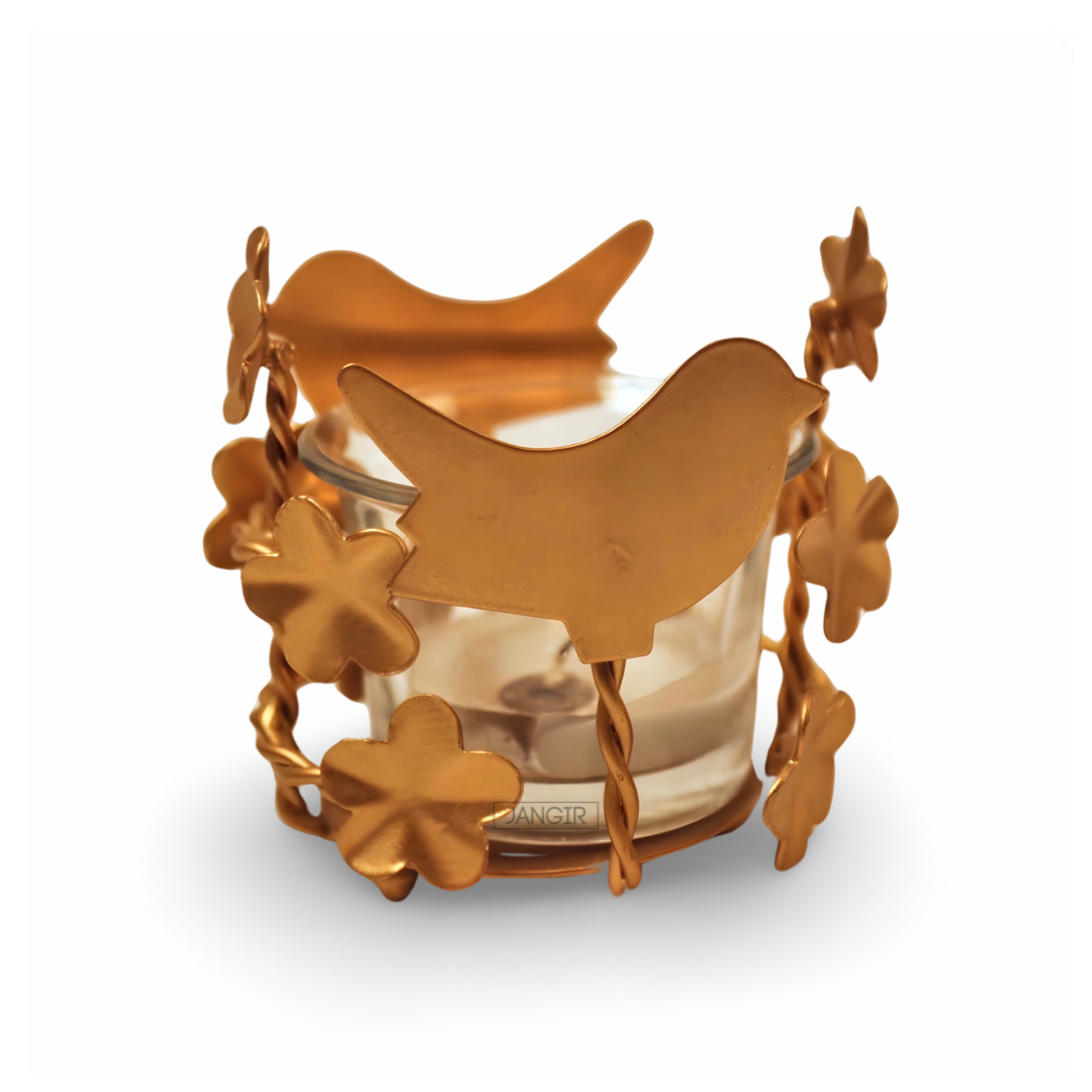 Tea Light Holder - Discover the exquisite Tea Light Holder Crafted from metal this chic bird-themed tea light holder embodies elegance and warmth. Elevate any space with unscented tealights, Buy now
