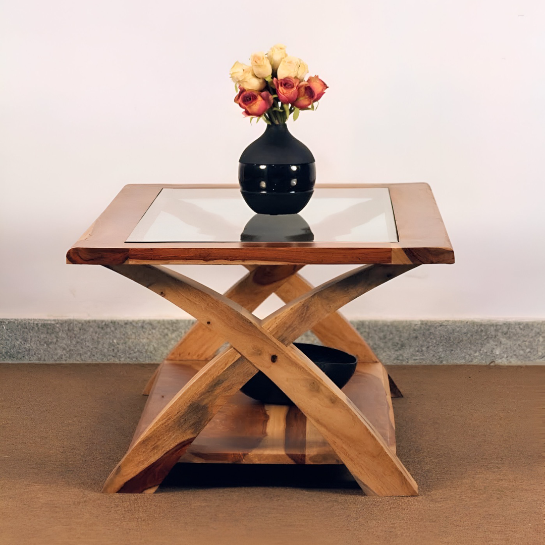 Transform your living room with our designer coffee table with open storage and a glass top. Made with sheesham wood. Elevate your home decor with our center tables near you in Bangalore, Shop Now