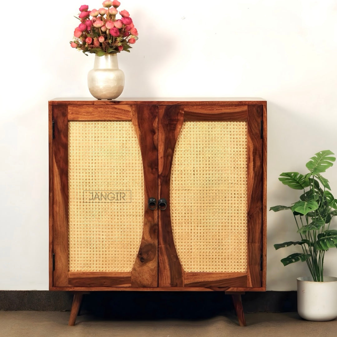 Upgrade your living room with our Mewar Cane Cabinet With Two Doors, made from sheesham wood. Buy Wicker/ Rattan Cabinet for living room near you in Bangalore