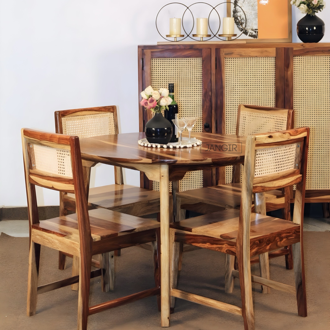 Elevate your dining experience with a modern round dining table set. This four seater dining table with cane chairs crafted from sheesham wood. Explore our dining table collection today !