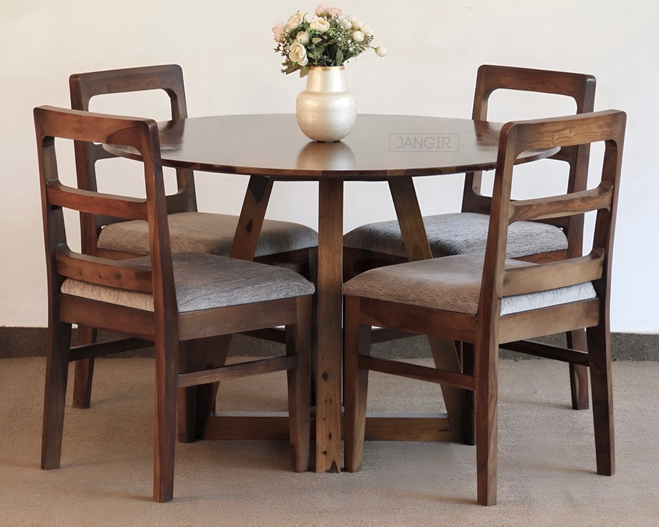 Upgrade your dining experience with Stear Round Dining Table Set made from sheesham wood, ensure durability and modern style with this four seater dining table set. Elevate your dining room now.