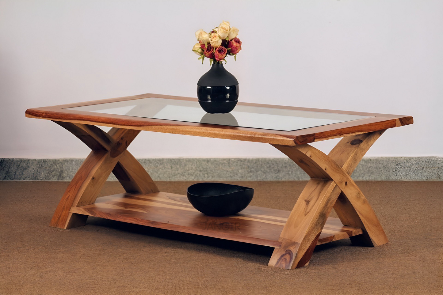 Transform your living room with our designer coffee table with open storage and a glass top. Made with sheesham wood. Elevate your home decor with our center tables near you in Bangalore, Shop Now