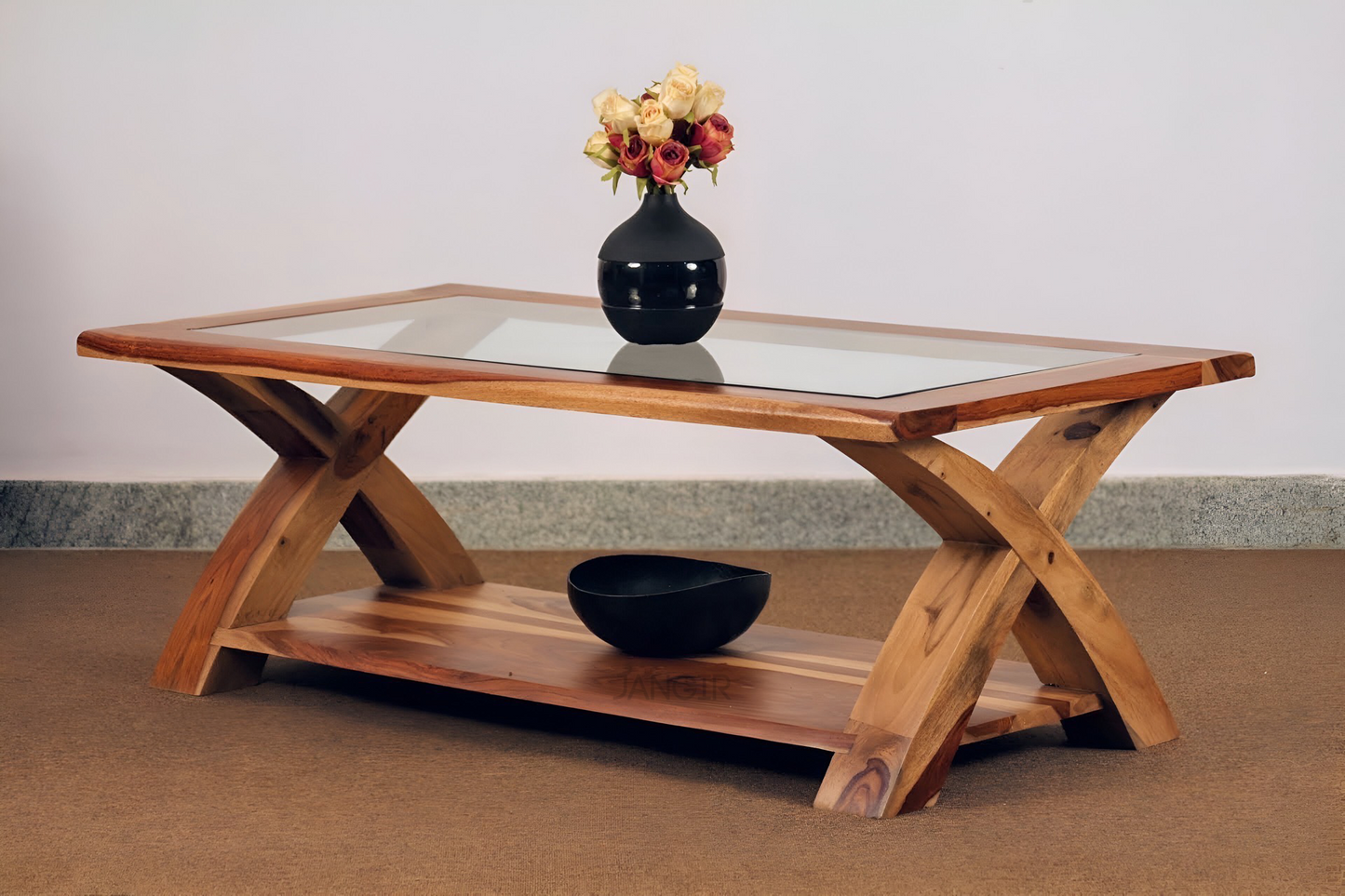 Transform your living room with our designer coffee table with open storage and a glass top. Made with sheesham wood. Elevate your home decor with our   center tables near you in Bangalore, Shop Now