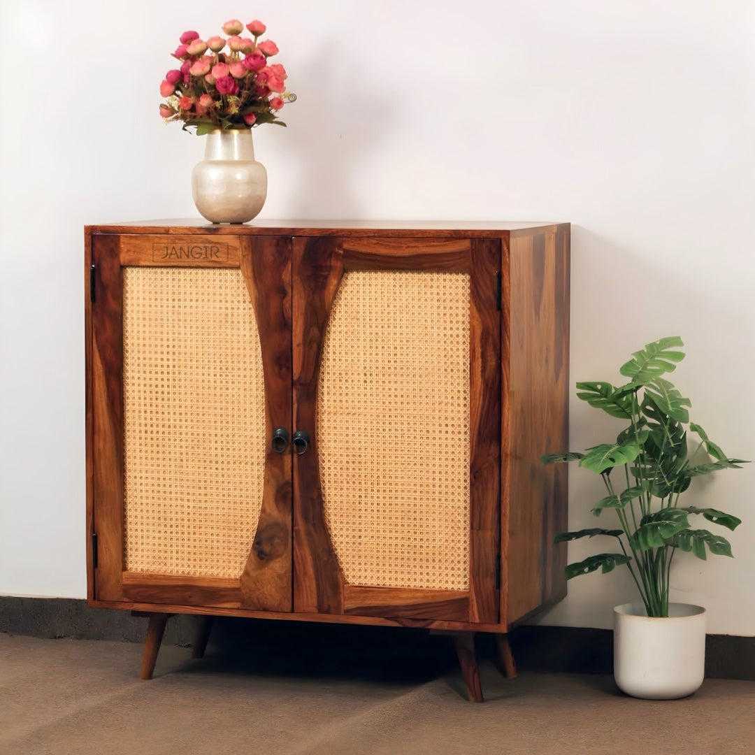 Upgrade your living room with our Cane Cabinet, made from natural cane and sheesham wood.  Our Sideboard with two doors is the perfect any home. Shop online or visit our Bangalore store today.