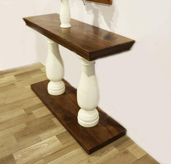 Elevate your living room with our durable and stylish Royal console table, made from sheesham wood with white solid round legs. Add a touch of elegance today!