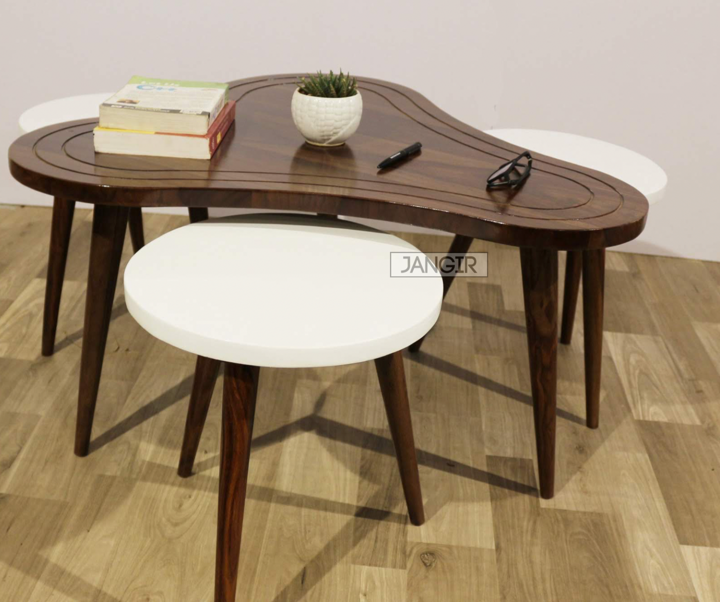 Check out our range of exquisite coffee tables with stools made from sheesham wood! Designed to elevate any space, these center tables offer both comfort and contemporary style. Visit us in Bangalore