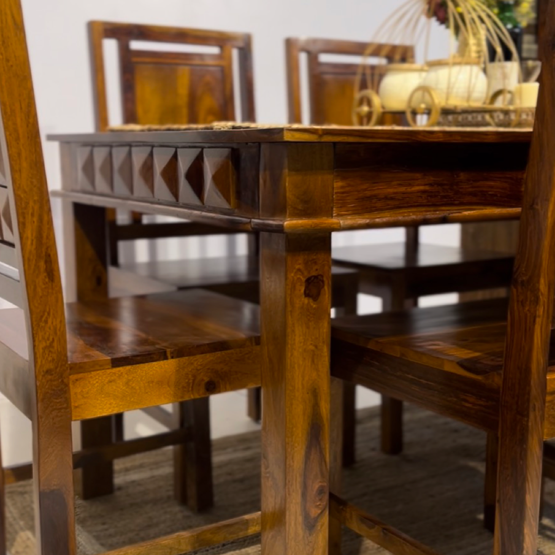 Enhance the elegance of your dining space with a six and four seater wooden dining table and chairs made with sheesham wood, combination that exudes timeless style and sophistication. Shop now