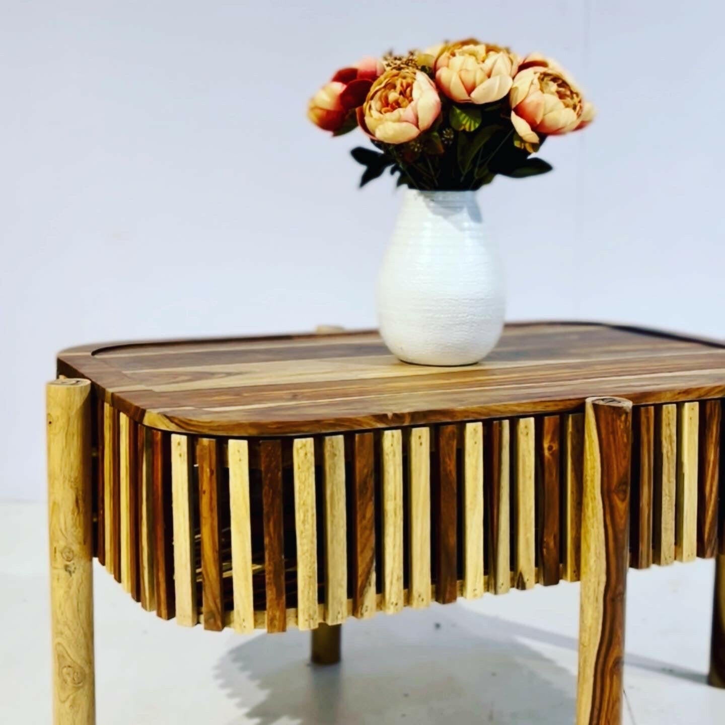 Elevate your space with our sheesham wood Silver grills coffee table with storage. Shop our designer center tables near you in Bangalore