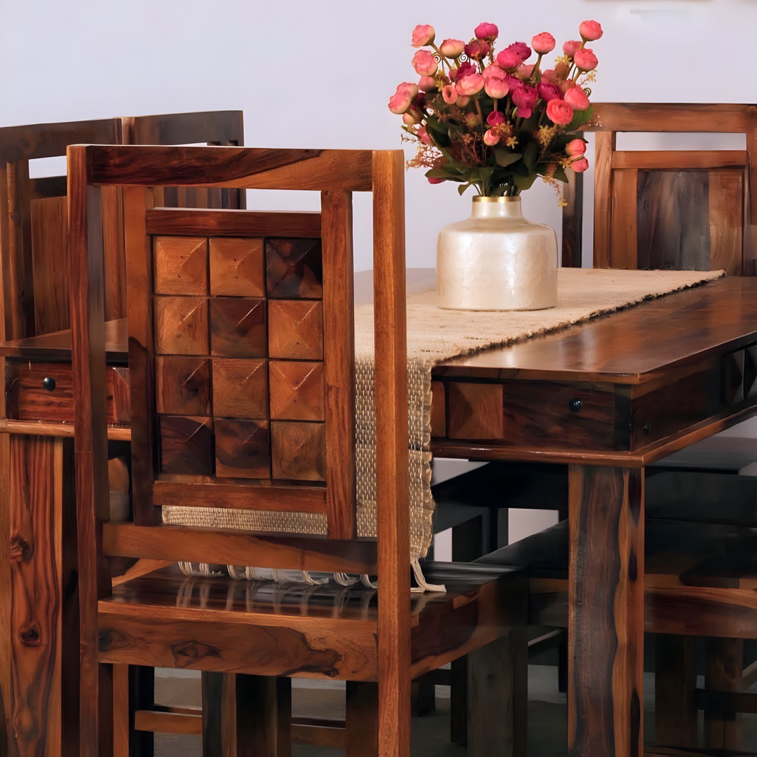 Enhance the elegance of your dining space with a six and four seater wooden dining table and chairs made with sheesham wood, combination that exudes timeless style and sophistication. Shop now