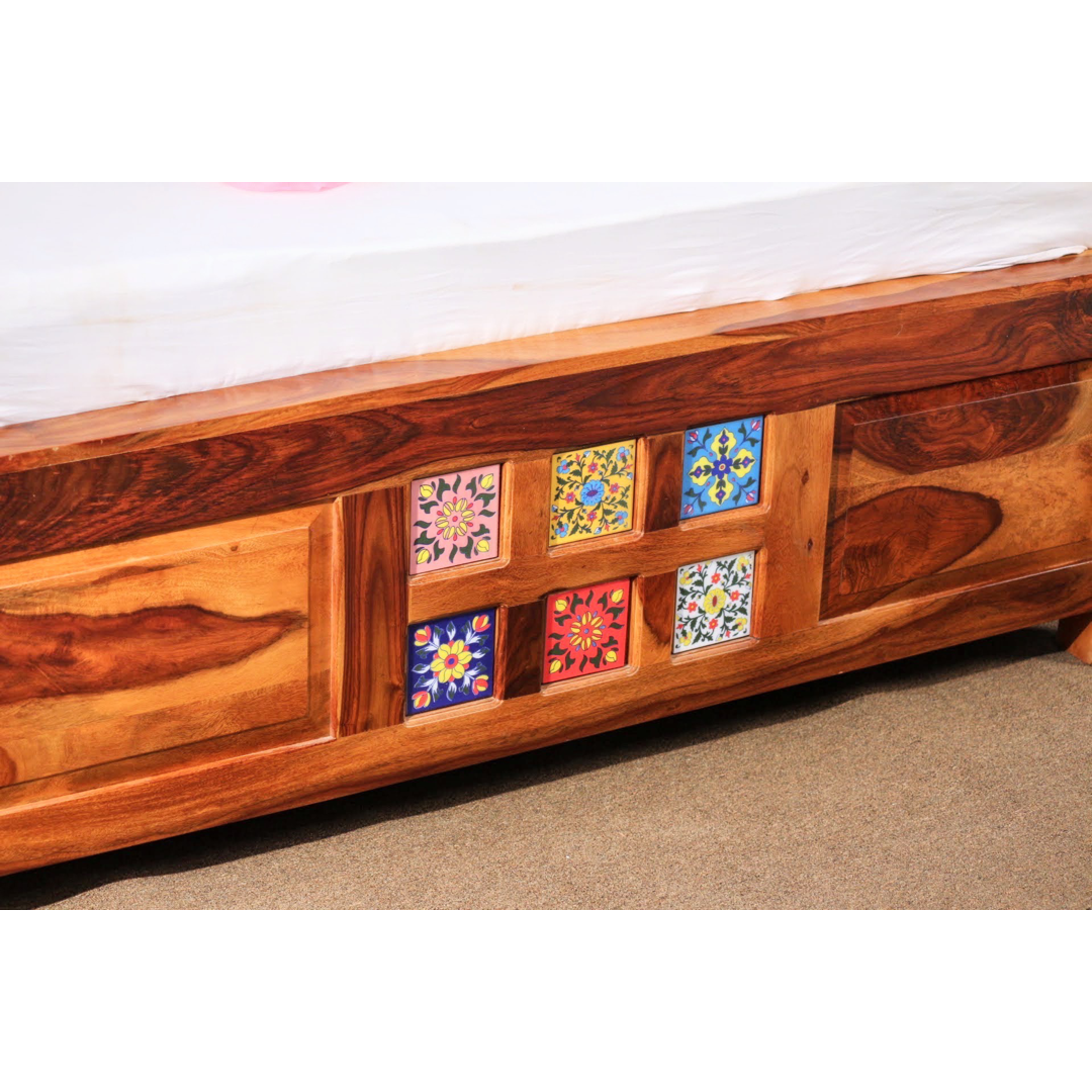 "Transform your bedroom with our exquisite collection of Tiles Plane Solid Wood Storage Bed, with traditional Rajasthani tile designs while experiencing true comfort in king or queen size variants.