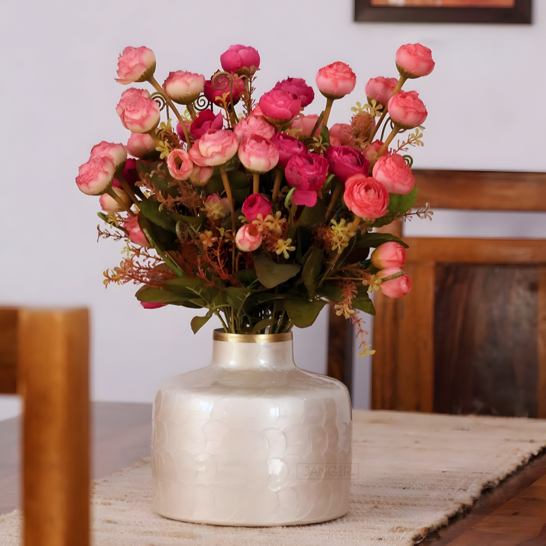 Discover the perfect addition to your living space with our stunning flower vase in a timeless pearl white shade, crafted with metal buy online now and add a touch of elegant charm to your home.