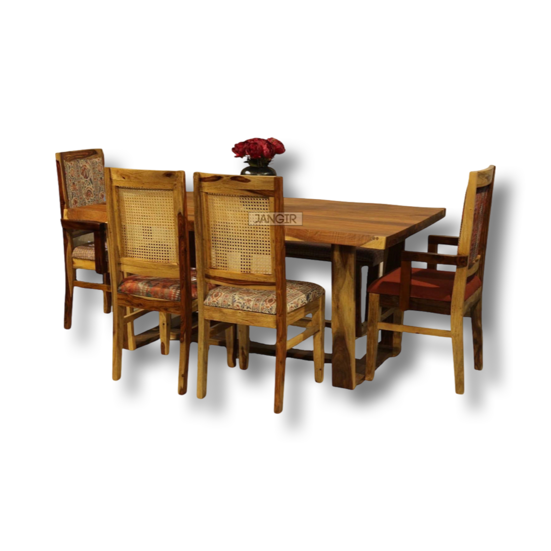 Elevate your dining experience with our exquisite live edge dining table crafted from premium sheesham wood. Accompanied by cane weave chairs & two arms chairs, buy luxury six seater dining table now
