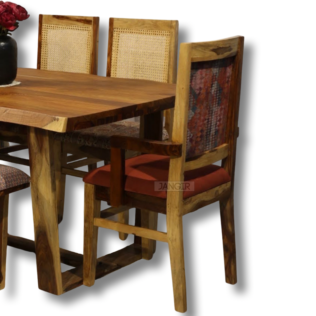 Elevate your dining experience with our exquisite live edge dining table crafted from premium sheesham wood. Accompanied by cane weave chairs & two arms chairs, buy luxury six seater dining table now