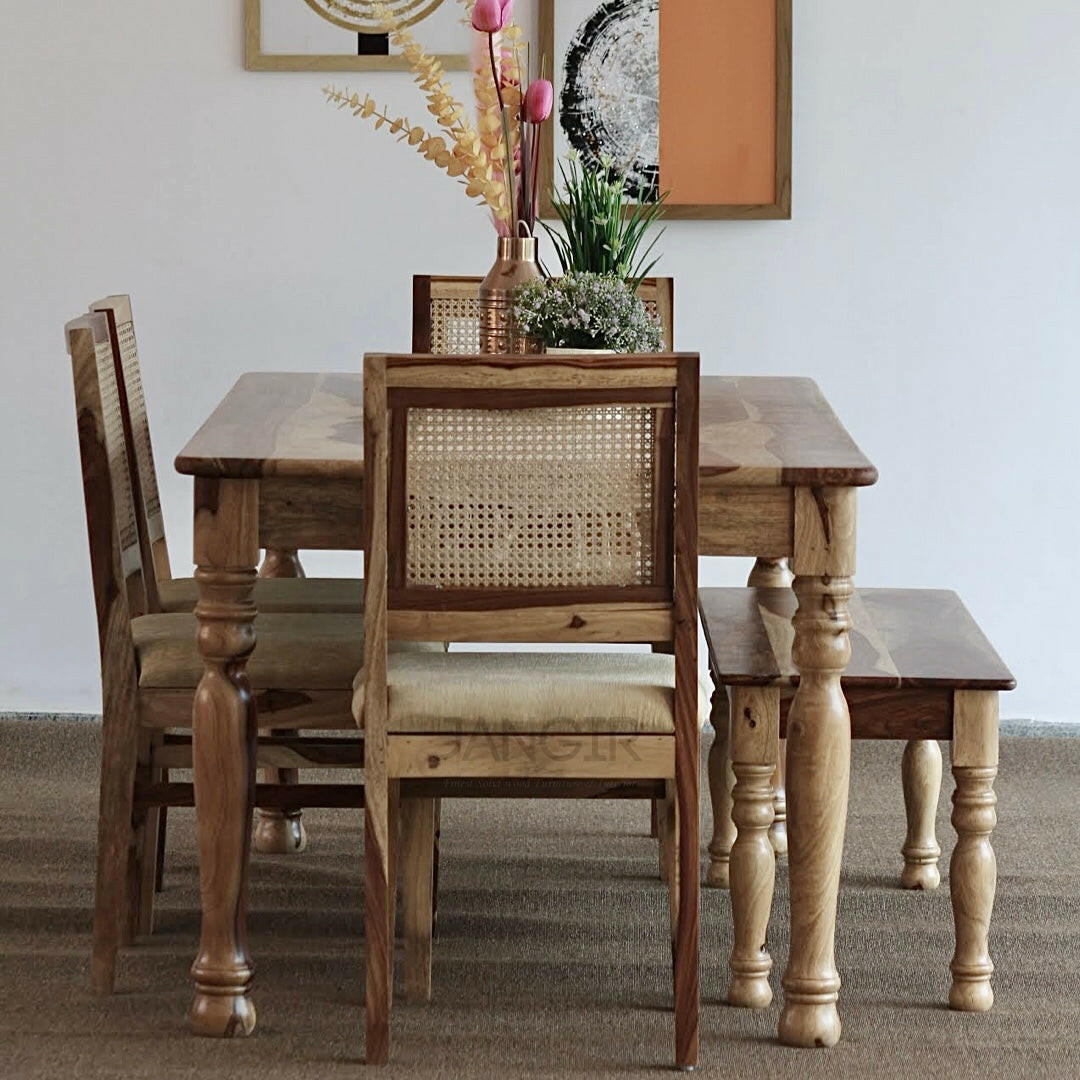 Upgrade Your Dining Space with a Stylish Round Leg Dining Table and Cane Weave Chairs! Discover our six-seater sheesham wood dining table set for a premium touch near you in Bangalore, Shop today!