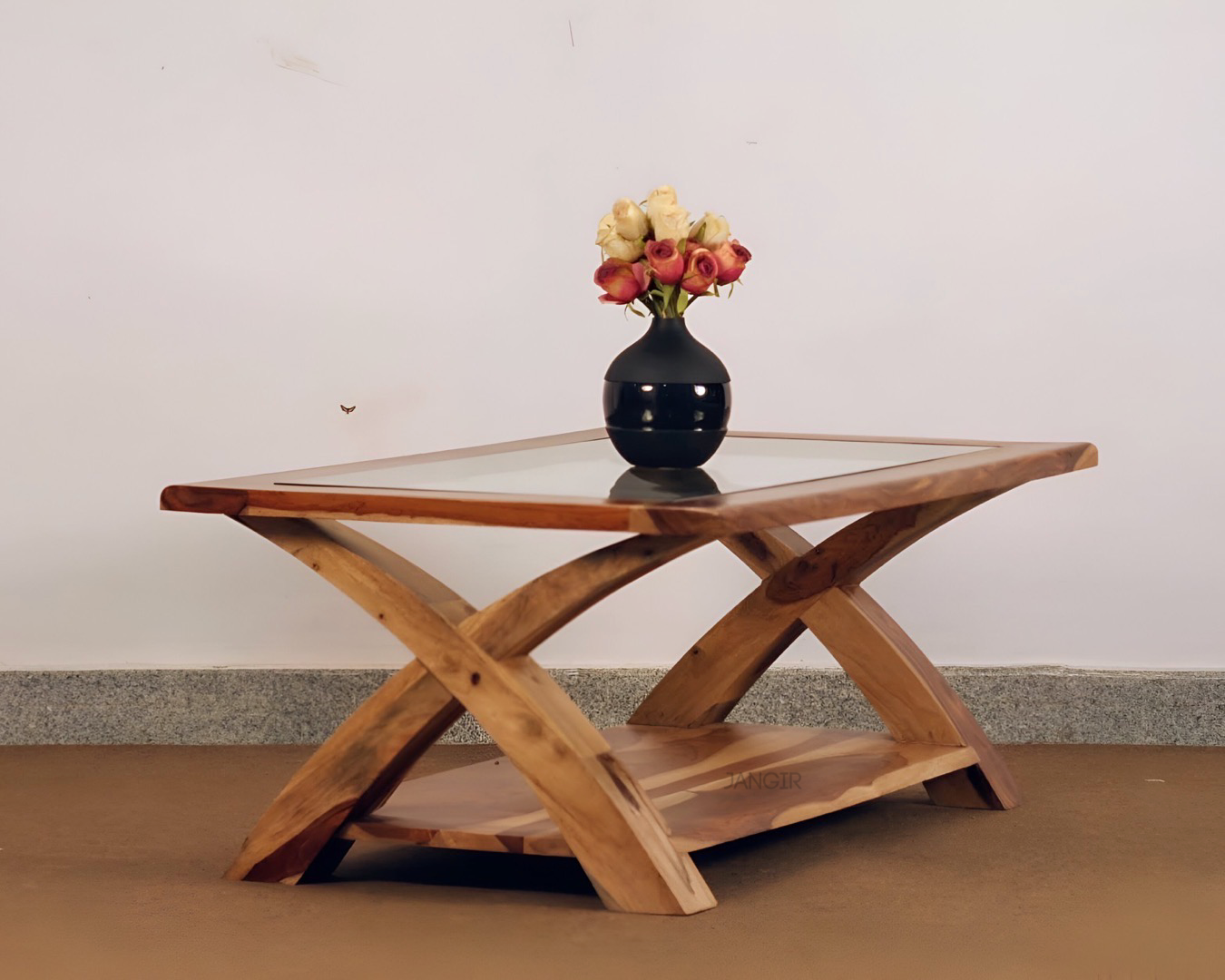 Transform your living room with our designer coffee table with open storage and a glass top. Made with sheesham wood. Elevate your home decor with our   center tables near you in Bangalore, Shop Now
