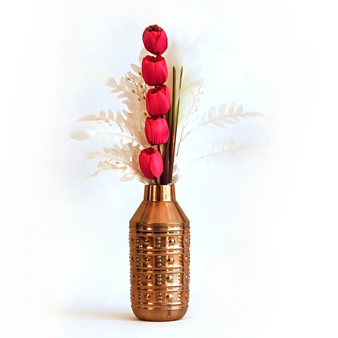 Discover the epitome of elegance with our Rose Gold Bottle Flower Vase. Made from metal with a premium rose gold finish, this vase will add luxury to any room in your home. Enhance your home decor