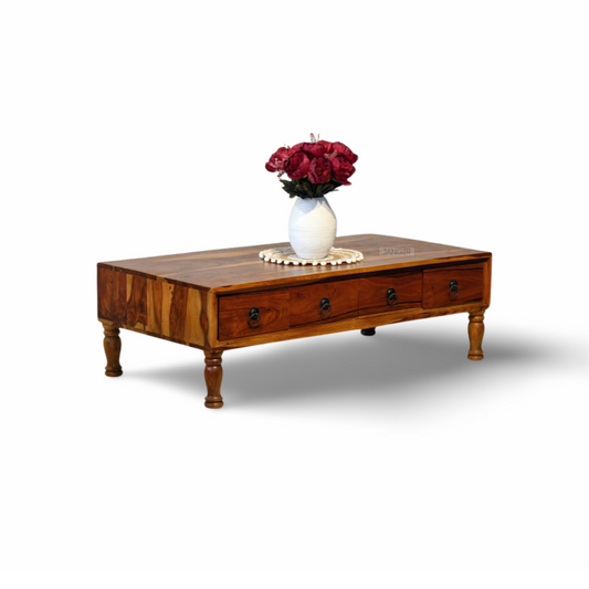 Elevate your living room with our stylish low coffee table near you in Bangalore. Made from sheesham wood, this center table designed with drawers that magically make messes disappear. Get yours now!