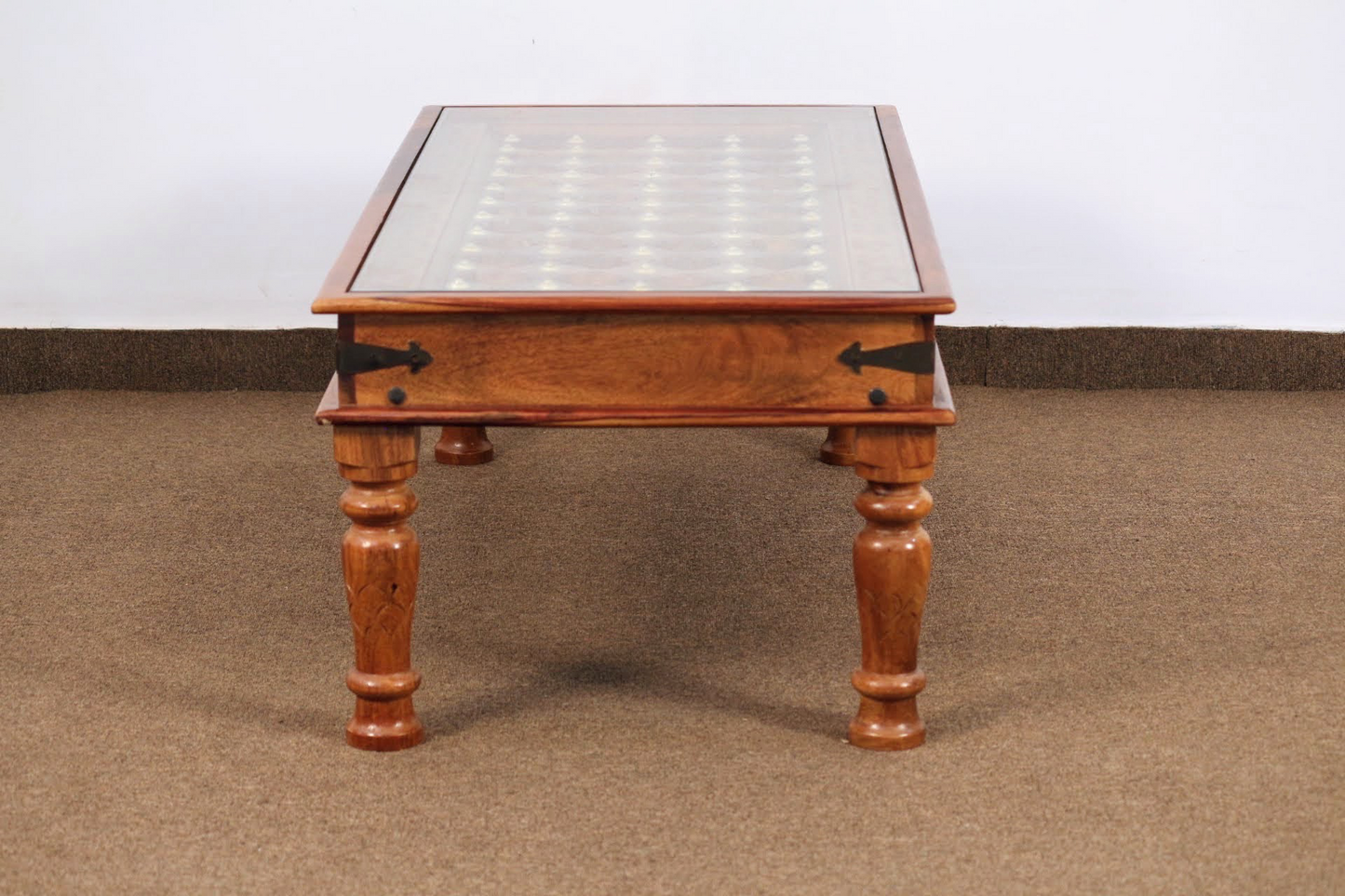 elevate your home with our Antique Carved Door Solid Wood Coffee Table with Vintage style Rajasthani Brass work and stunning carved door style. Upgrade your living room with our center table now !