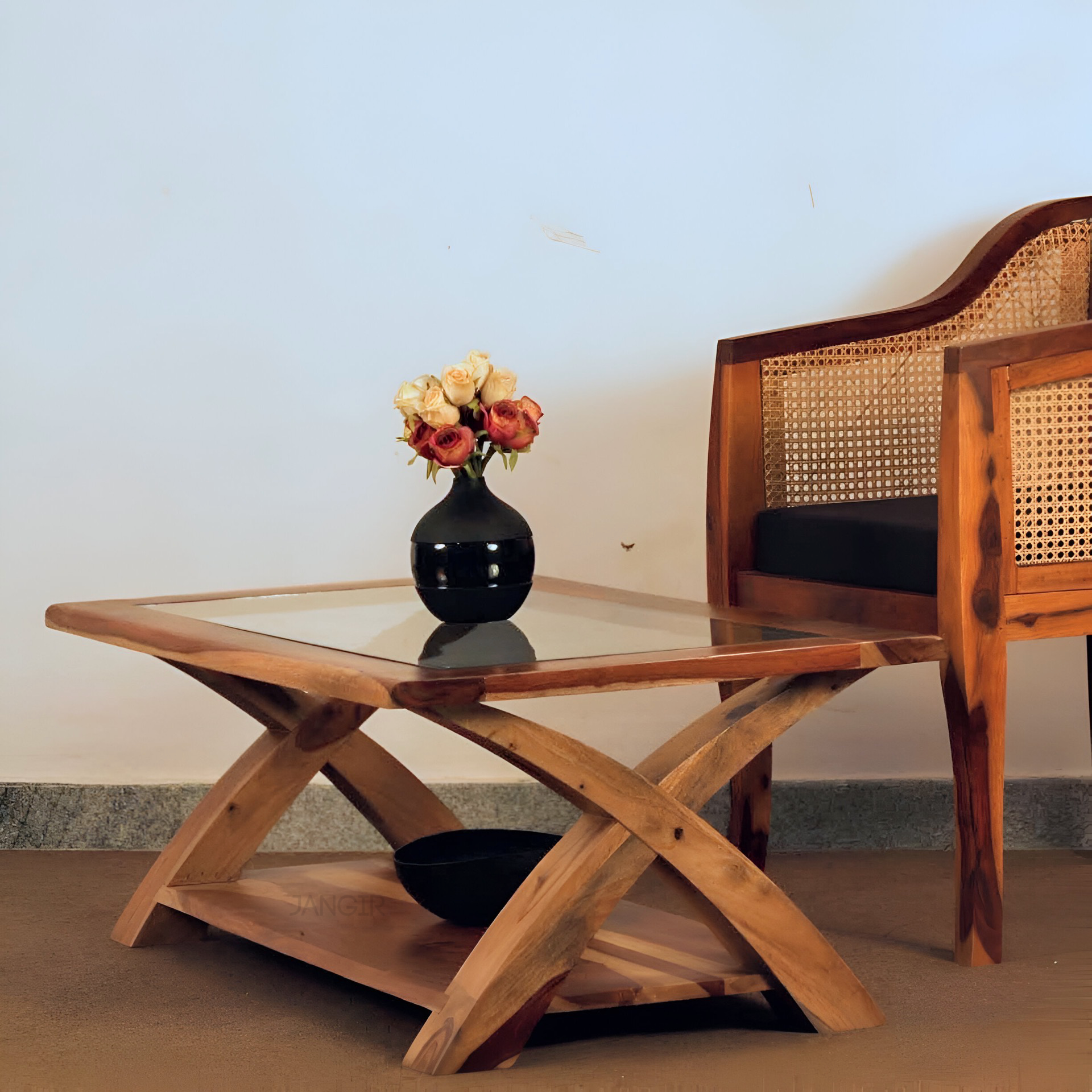 Transform your living room with our designer coffee table with open storage and a glass top. Made with sheesham wood. Elevate your home decor with our   center tables near you in Bangalore, Shop Now