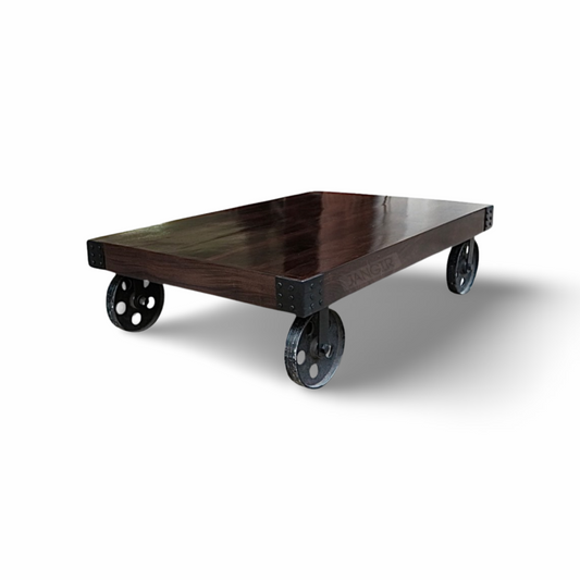 Enhance your living space with our stylish industrial coffee table with wheels, crafted from Sheesham wood and accented by sturdy metal wheel legs. Explore now for a touch of rustic charm!