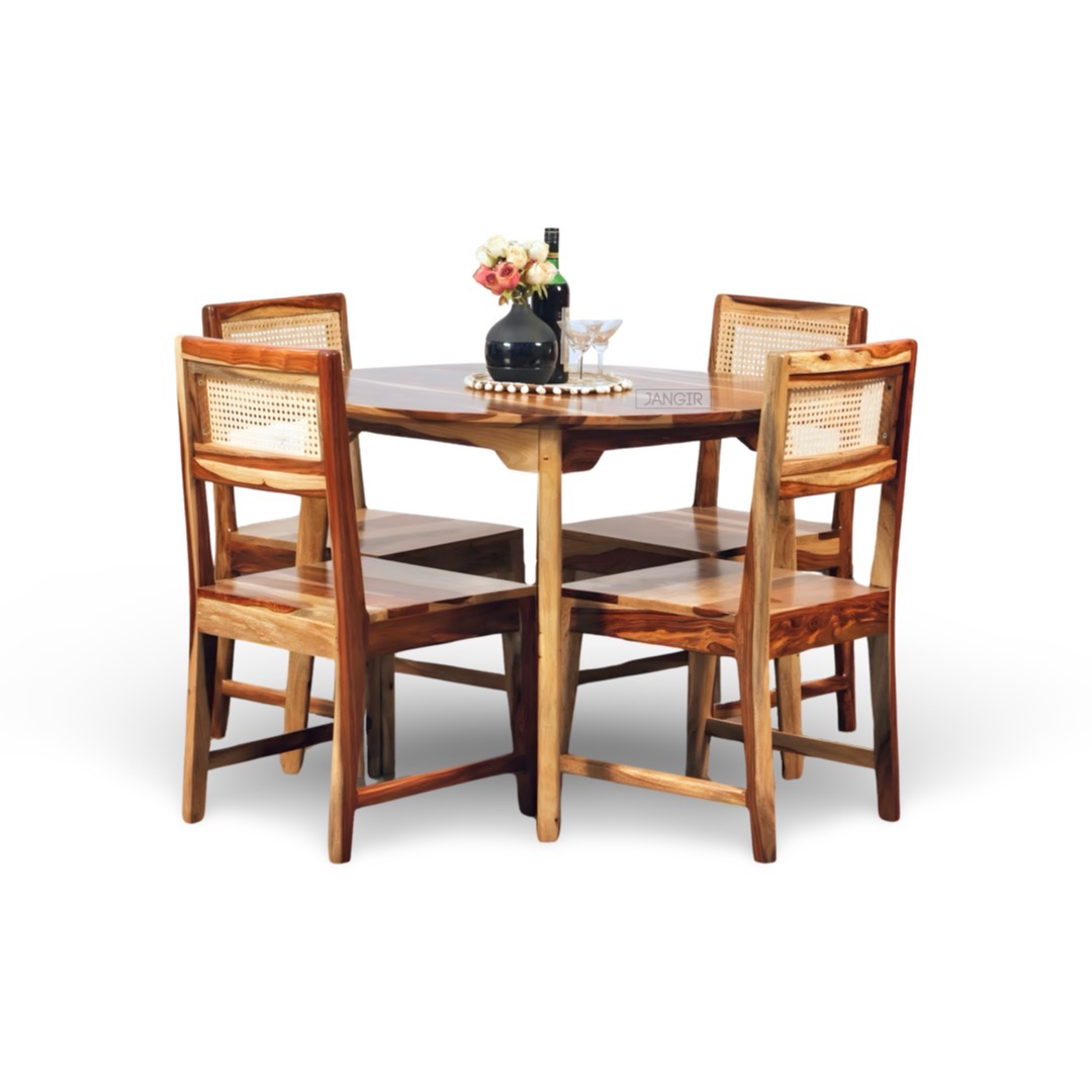 Elevate your dining experience with a modern round dining table set. This four seater dining table with cane chairs crafted from sheesham wood. Explore our dining table collection today !