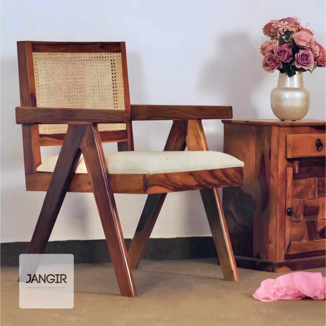 Enhance your living room with our exquisite collection of wooden cane chairs. Crafted from durable sheesham wood, our wooden easy chairs combine comfort and style with wicker. Explore our range now!