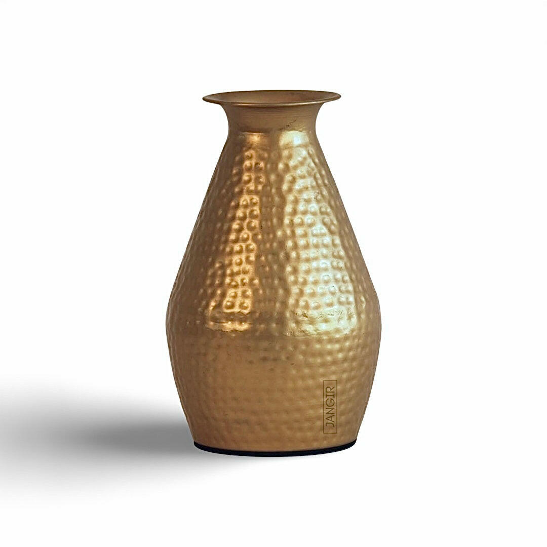Discover the elegance of our handcrafted hammered metal vase with a sleek brass finish near you in Bangalore. Add a touch of sophistication to your living room or gift it to someone special today!