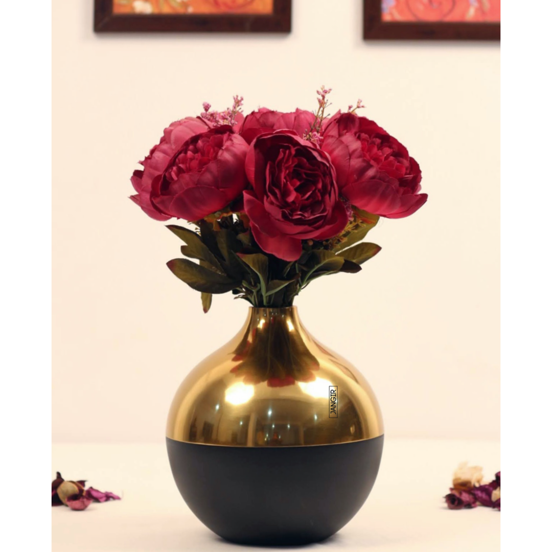 Elevate your home decor with our stunning flower vase. Crafted from high-quality metal, this luxurious piece is the perfect addition to any living room. Buy now to bring sophistication into your space