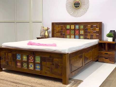 'Transform your bedroom with our exquisite collection of Tiles Plane Solid Wood Storage Bed, with traditional Rajasthani tile designs while experiencing true comfort in king or queen size variants.