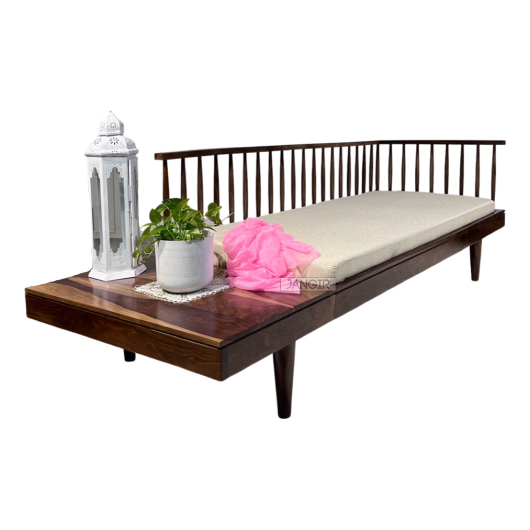 Grills Daybed! This wooden daybed is the perfect addition to any living space. Crafted from solid shessham wood, this designer daybed delivers no-nonsense charm and style with its mid-century inspired design. Its traditional rectangular shape with subtle arched sides adds a touch of finesse and elegance to any room.