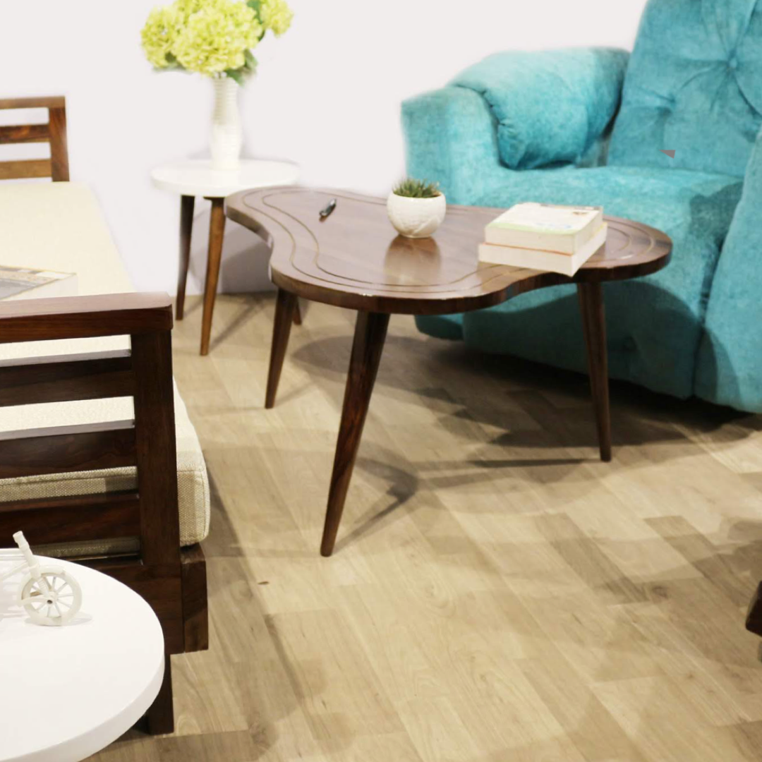 Check out our range of exquisite coffee tables with stools made from sheesham wood! Designed to elevate any space, these center tables offer both comfort and contemporary style. Visit us in Bangalore