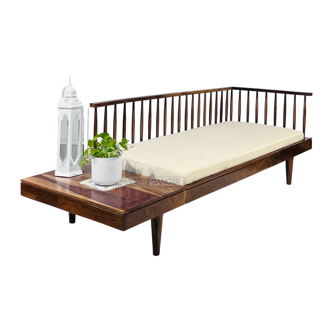 Grills Daybed! This wooden daybed is the perfect addition to any living space. Crafted from solid shessham wood, this designer daybed delivers no-nonsense charm and style with its mid-century inspired design. Its traditional rectangular shape with subtle arched sides adds a touch of finesse and elegance to any room.