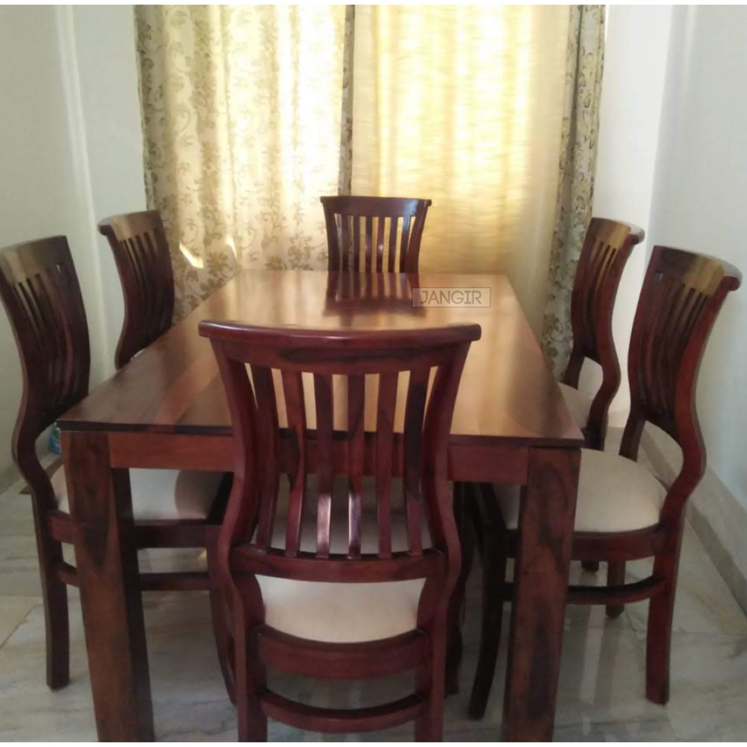 Elevate your dining area with  designer wooden dining tables near you in Bangalore. Whether you need a 6 or 4 seater set, we have the perfect solution for you. Transform your dining experience today!
