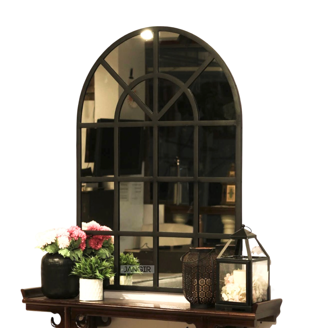 Elevate your home with our exquisite arched wall mirror reminiscent of classic window style. Add a touch of glamour and open up your space with the perfect metal accent for foyer or hallway. Shop now